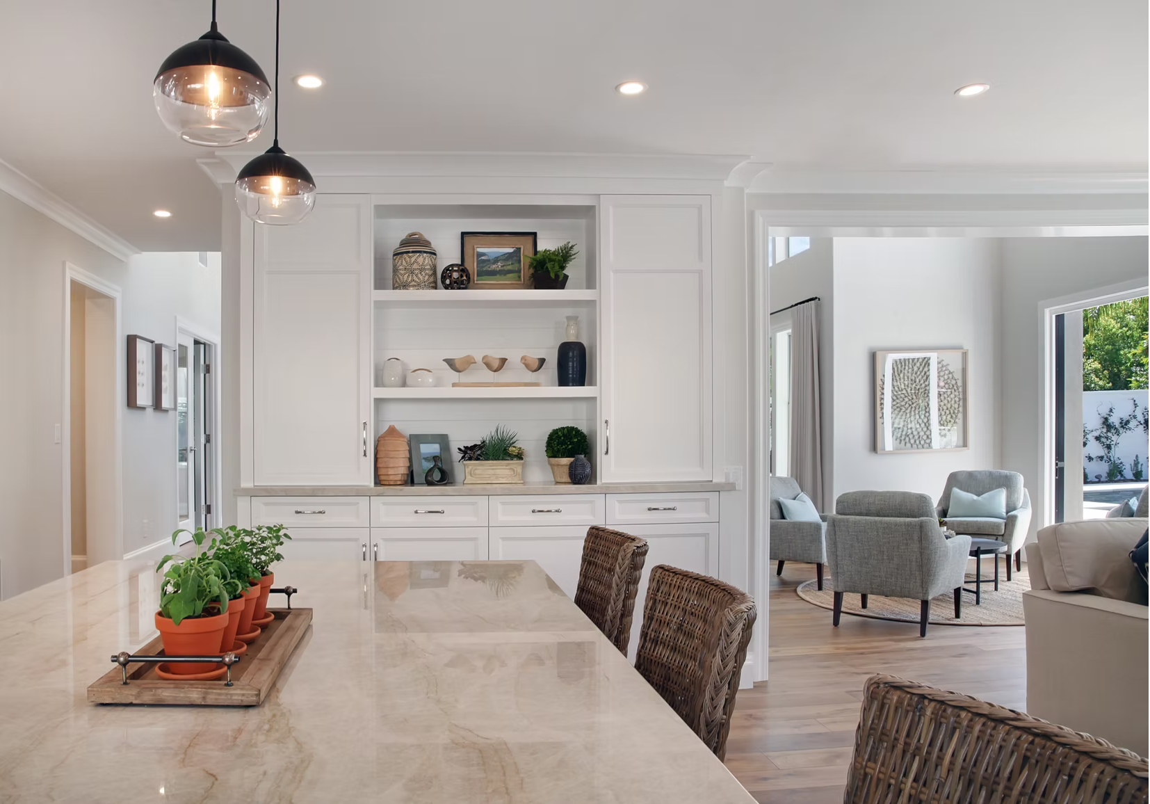 Modern White Kitchen with Pendant Lights