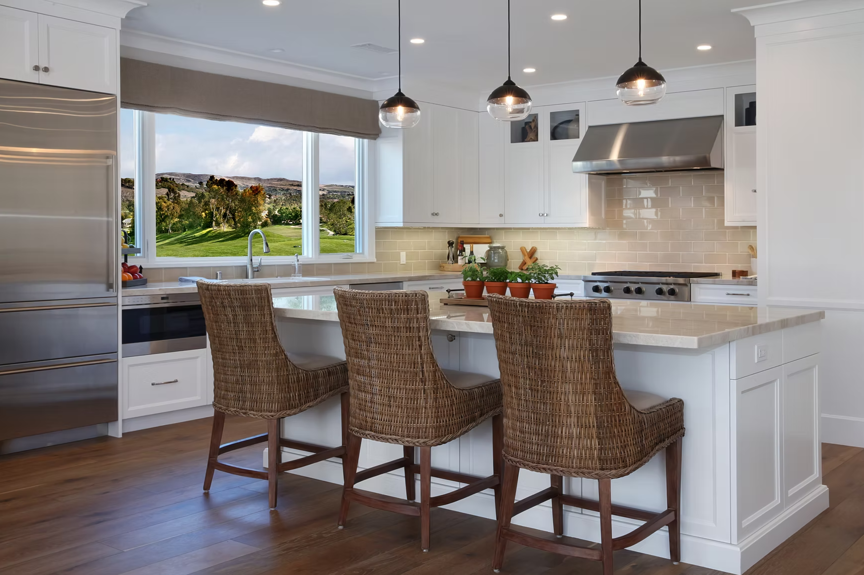 Kitchen with Island and Rattan Chairs